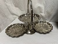 tray fully open showing three clamshell dishes and handle