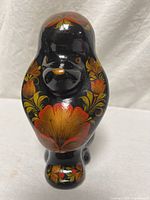 Front view showing painted face and floral design