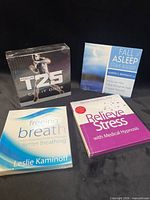 Front view showing all four sealed CD sets