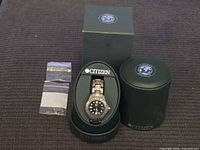 Watch in presentation case with boxes and spare links