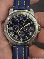 Front view of Invicta watch showing dial details