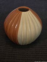 Full view of two-tone fluted melon vase