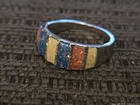 Top view showing multicolour glitter enamel stripes on sterling silver band