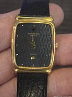Front view showing dial, case and strap
