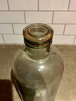 Top view of glass stopper seated in jar neck