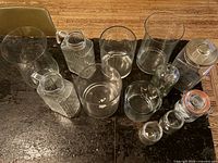 Group shot of all clear glass vessels on countertop
