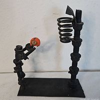 Front view showing full sculpture with both figures