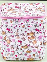 Front view showing Hello Kitty print, front pocket, pink zipper