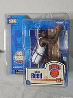 Front view of sealed Willis Reed NBA Legends figure in packaging