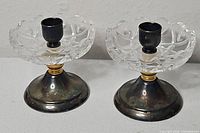 Pair of RCR crystal candlestick holders front view