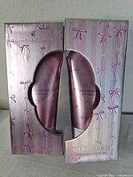 Front of boxed duo showing brand and product line