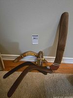 Group shot of four boomerangs and bullroarer
