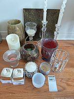 Group shot showing all candle holders and gold vase