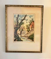 Full view of framed landscape print on wall