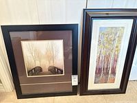 Both framed artworks side by side