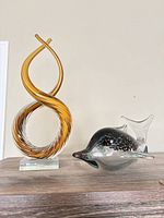 Overall view of both art glass items