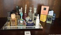 All perfume bottles and tray grouped together