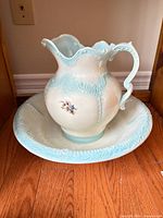 Pitcher nested in basin showing full set