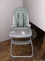 Full view of folding high chair