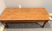 Top view of the coffee table showing rectangular wood surface