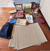 Entire lot laid out showing textiles and decor