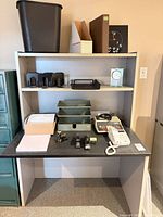 Front view of desk showing shelves and work surface