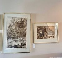 Both framed etchings on wall