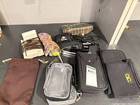 All travel accessories laid out on countertop