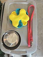 Nested stainless bowls, treat puzzle, leash overview