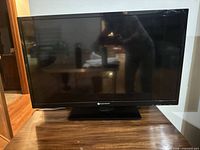 Front view of Element flat panel TV on stand