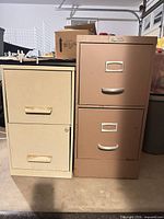 Front view of both 2-drawer file cabinets, beige lateral and brown vertical