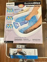 Boxed HoMedics Bubble Bliss foot spa and boxed suction grip bar