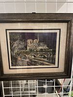 Front view of framed Notre Dame print showing artwork, mats and metallic silver wood frame