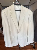 Front view of ivory Lauren Ralph Lauren suit jacket on hanger