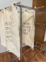 Both canvas banners on metal rods