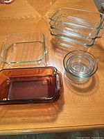 Group shot of all Pyrex dishes and bowls on table