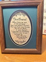 Oval-matted Best Friend poem in brown wood frame