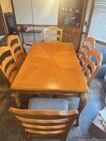 Top view of rectangular table with six chairs surrounding