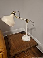 Lamp full view on side table, showing overall design
