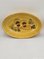 Top view showing full oval shape and interior Mushroom & Carrot design