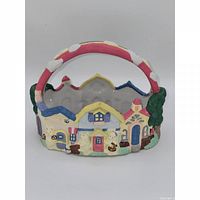 Front view showing rainbow handle, cottage and bunny detailing