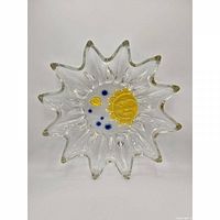 Top view showing starburst shape and celestial inserts