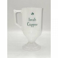 Front view showing text and shamrock, handle left