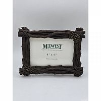 Front view showing twig and pinecone design and 4x6 opening