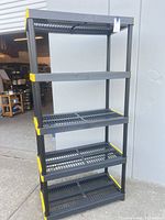 Full view of 5-shelf plastic unit standing upright