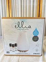 Front of box showing Ellia Blossom diffuser and three oils