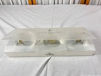 Boxed set of three glass tealight holders