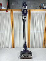 Full view of Shark purple upright vacuum