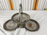 Front view of stand with three tiers extended