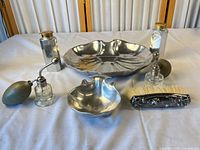 Full lot view showing all six vanity items arranged on table